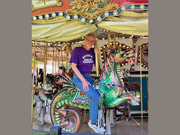 Riding a dragon (naturally!) on a merry-go-round in Philadelphia